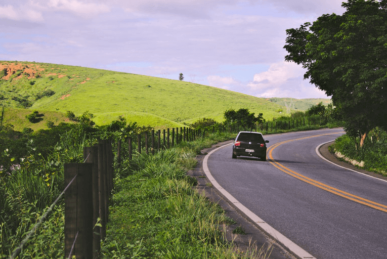 Car driving in country scene