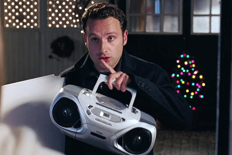 Mark in Love Actually with stereo on the doorstep Mark in Love Actually with stereo on the doorstep